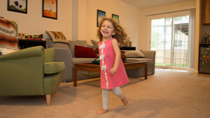 An  image shows a little girl running.