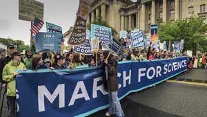 An image shows March for Science protesters.