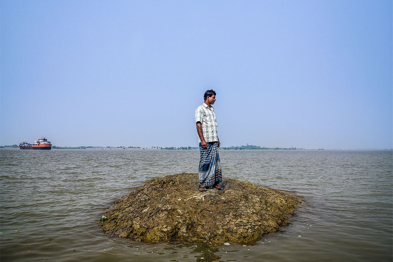 a man stands on a small island alone